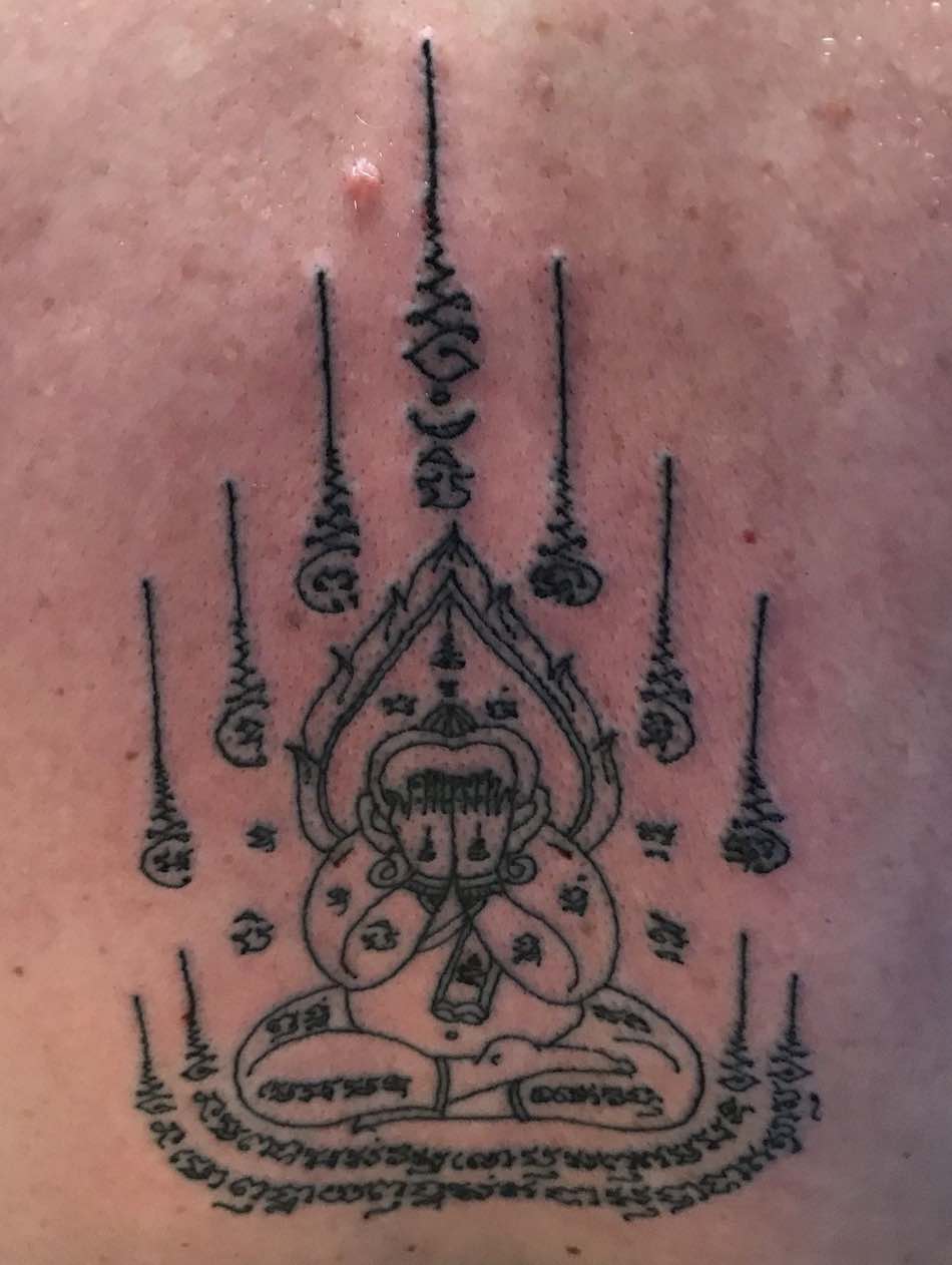 Closed Face Buddha Yantra — traditional Thai Sak Yant tattoo